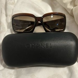 Used like new Chanel women’s sunglasses with mother of pearl Chanel logo